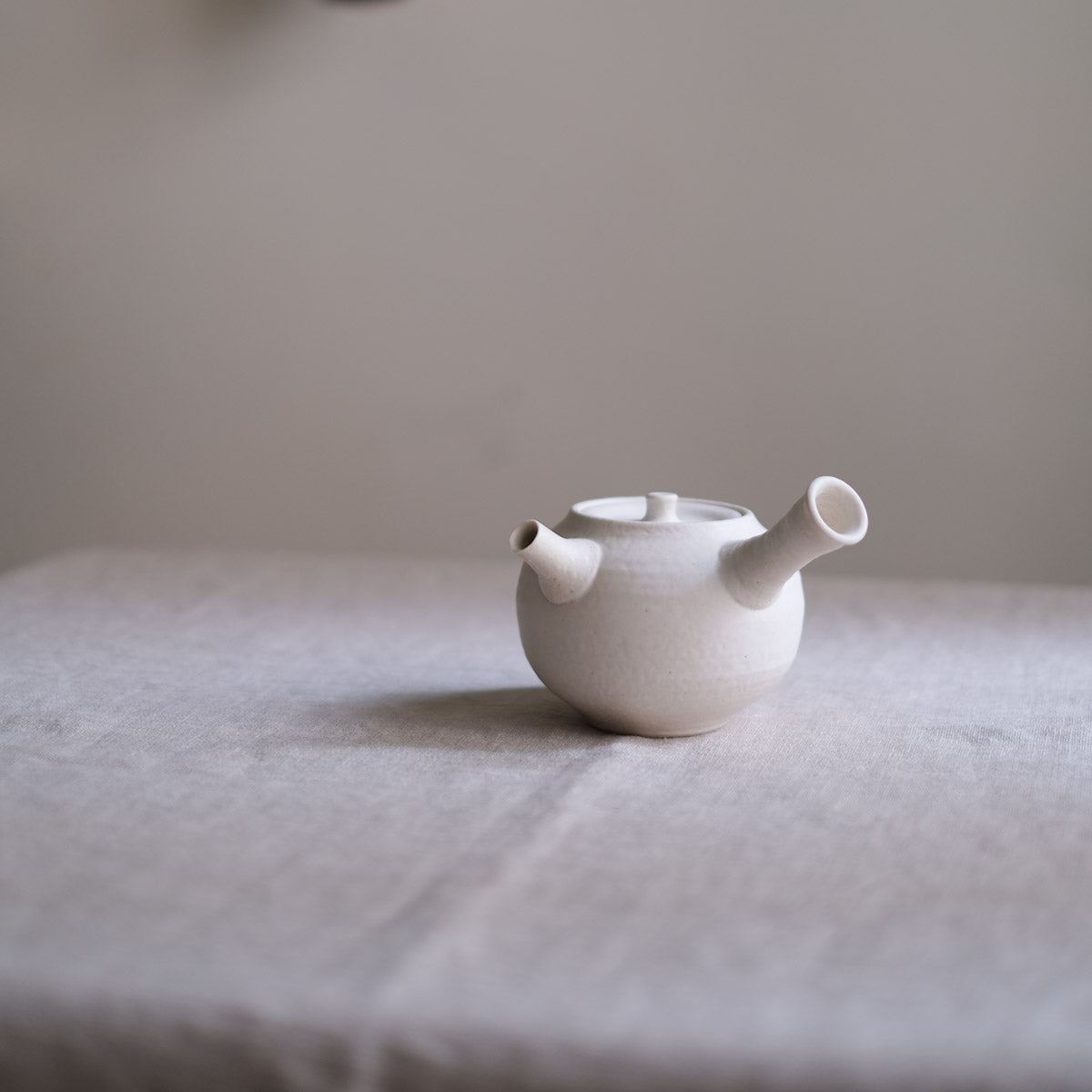 handmade tea pour, from porcelain clay and self created glaze.